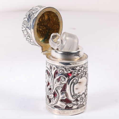 1596 - A late Victorian silver scent bottle, Arthur Pennington, Birmingham 1899, cylindrical form, with rel... 