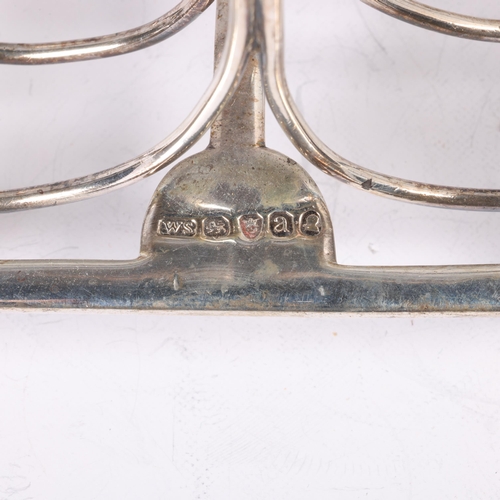 1600 - A George III silver 7-bar toast rack, William Stroud, London 1816, rectangular base raised on lion p... 