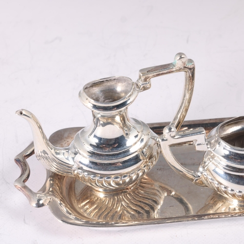 1611 - An Elizabeth II miniature silver 5-piece doll's tea set, Chick & Sons Ltd, London 1973, including 2-... 