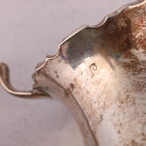 1615 - A silver sauce boat, by Orr, and a silver cream jug, height 8.5cm, 6.3oz total (2)