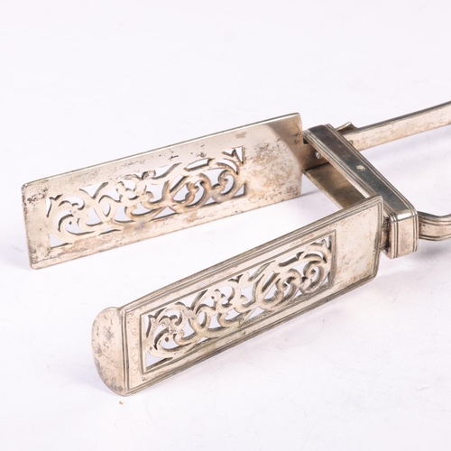 1616 - A pair of Victorian silver asparagus serving tongs, Samuel Hayne & Dudley Cater, London 1840, with s... 