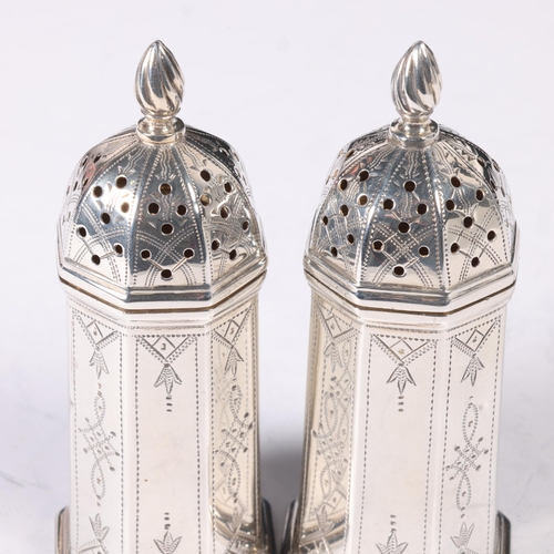 1636 - A pair of Victorian Aesthetic Movement silver pepperettes, Hilliard & Thomason, Birmingham 1892, tap... 