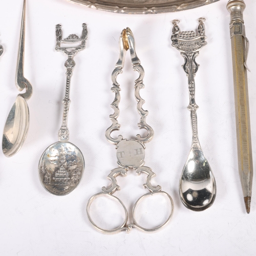 1653 - Various silver, including oval dressing table pin tray, souvenir spoons, sugar nips, etc, 6.9oz gros... 