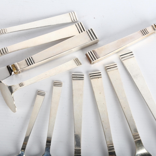 1682 - A group of Art Deco Danish silver flatware, retailed by Heimburger, circa 1933, including tablespoon... 