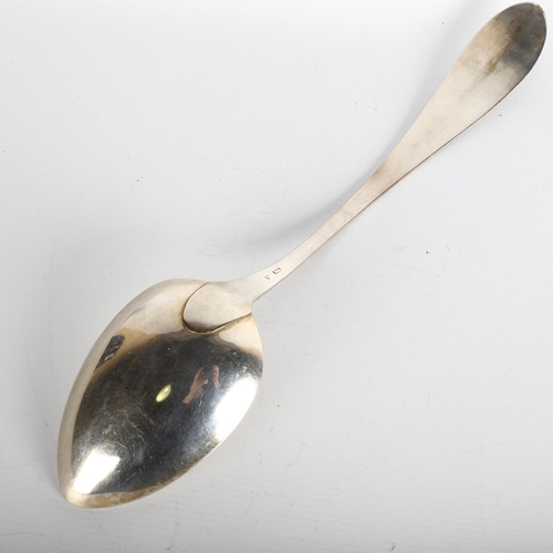 1684 - An unusual and very large Dutch? silver spoon, the handle with engraved scene, depicting guillotine ... 