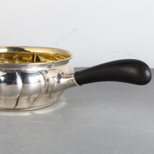 1694 - A Danish silver casserole, C G Paulsen, N Y Rosenborg, circa 1926, circular bulbous form with relief... 