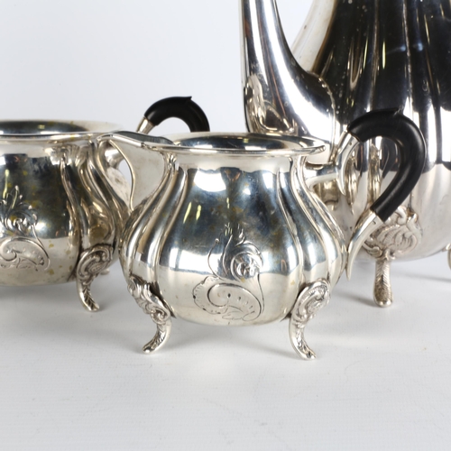 1701 - An Art Nouveau Danish silver 3-piece tea set, retailed by Heimburger, circa 1937, baluster form, wit... 