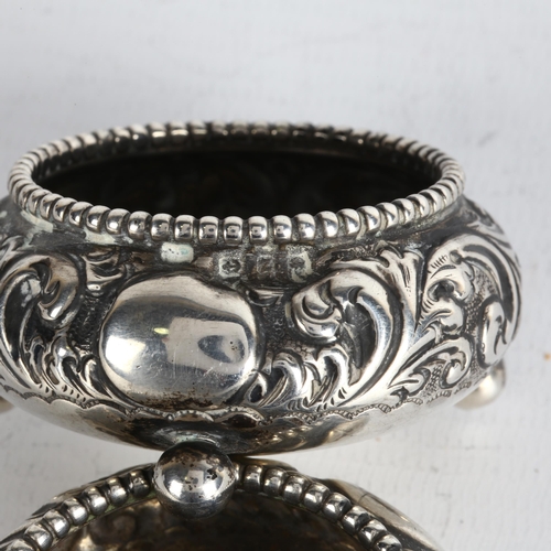 1730 - A pair of late Victorian silver salt cellars, indistinct maker, Birmingham 1899, circular form, with... 