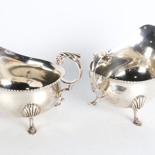 1737 - A pair of Edwardian silver sauce boats, Harrison Brothers & Howson, Sheffield 1904, bulbous form, wi... 