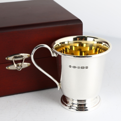 1742 - An Elizabeth II silver christening mug, by Carr's, Sheffield 2011, tapered cylindrical form, with fl... 