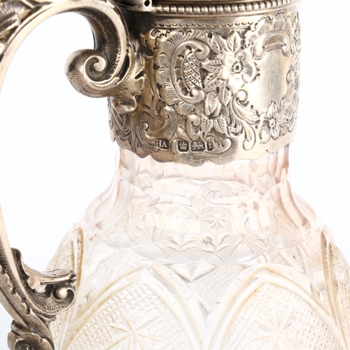 1750 - An Edwardian silver-mounted glass Claret jug, Atkin Brothers, Sheffield 1901, bulbous form with reli... 