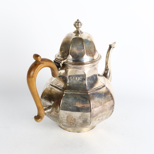 1754 - An Edwardian silver teapot, Daniel and John Wellby, London 1905, octagonal squat form, with turned w... 