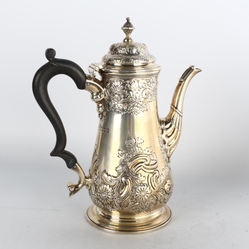 1757 - A late Victorian silver coffee pot, Henry Stratford, London 1897, tapered cylindrical form, with rel... 