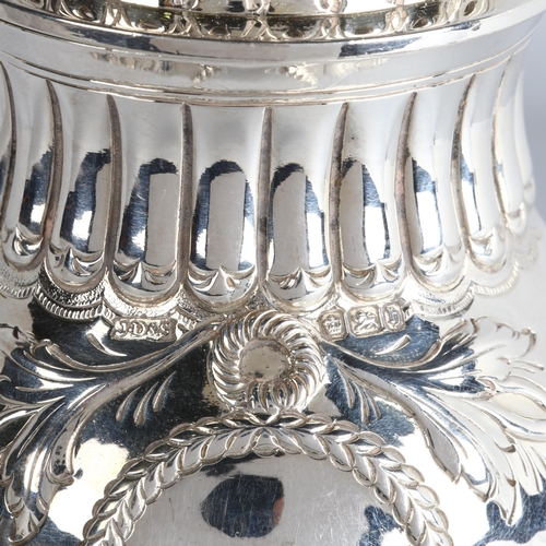 1763 - A late Victorian silver sugar caster, James Dixon & Sons, Sheffield 1900, baluster form, with relief... 