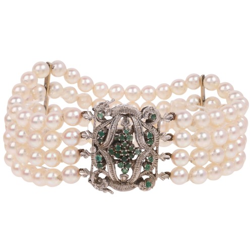 1227 - A Vintage multi-strand pearl bracelet, the quadruple-strand bracelet set with 5.8mm pearls separated... 