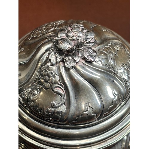 1690 - An Antique Continental silver box and cover, circular form, with allover relief embossed foliate dec... 