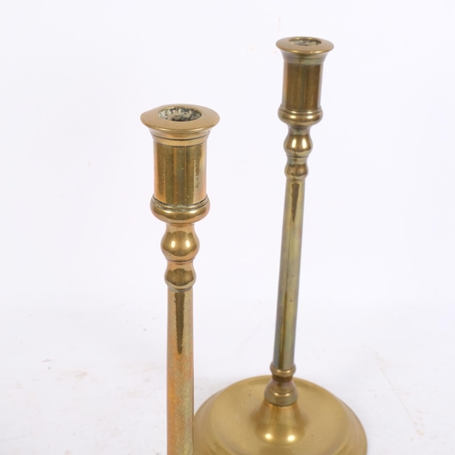 141 - A pair of 19th century brass table candlesticks, 31cm