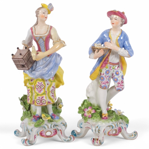 174 - A pair of Antique Continental porcelain figures, red painted dagger and anchor markers to base, 19cm