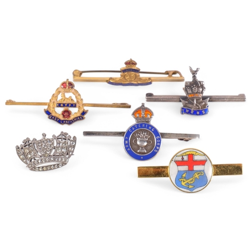 182 - A group of military brooches, including 2 silver sweetheart brooches, a Royal Navy paste set silver ... 