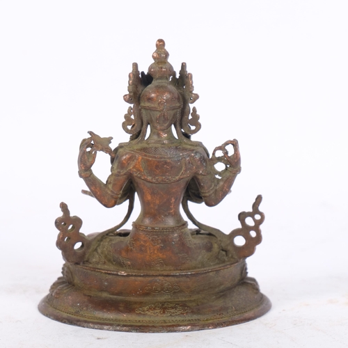 187 - A Chinese miniature bronze seated Buddha, on double lotus base, 10cm