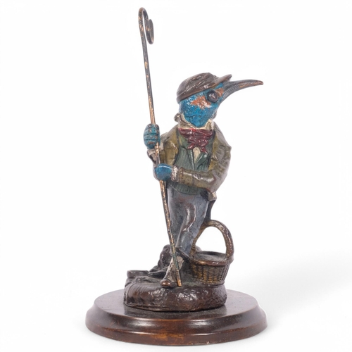 188 - After Louis Anquetin, a painted and gilded bronze model of a fisherman with hook and basket, on circ... 