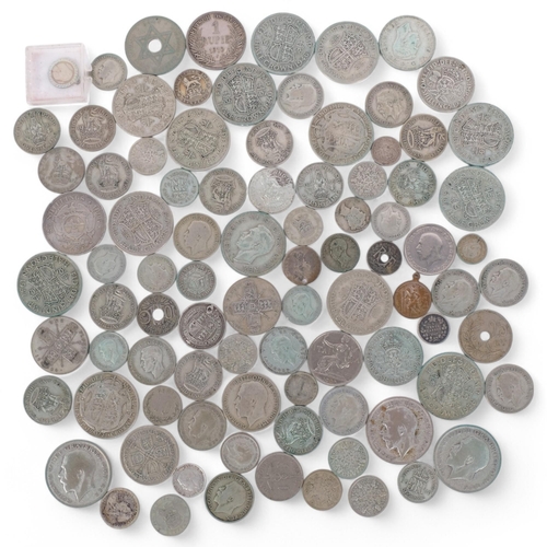 193 - A quantity of pre-1946 mainly English silver coins, and a silver St Christopher