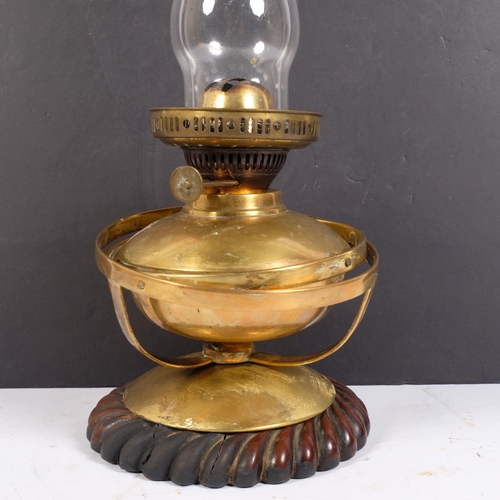 25 - A Vintage Duplex brass gimble base oil lamp, with clear glass funnel, overall 44cm