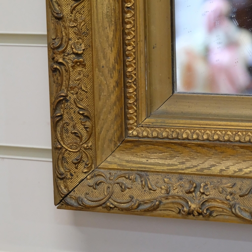 33 - WITHDRAWN - A Victorian gilt-gesso rectangular wall mirror, with relief foliate moulded edge, overal... 