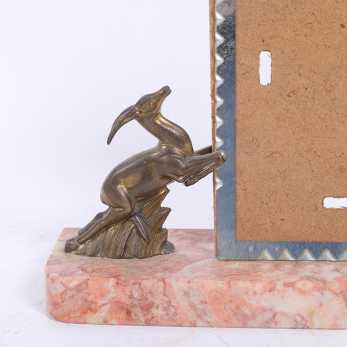 38 - An Art Deco gilt spelter and marble 'Leaping Antelope' photo frame, base 22cm x 6cm