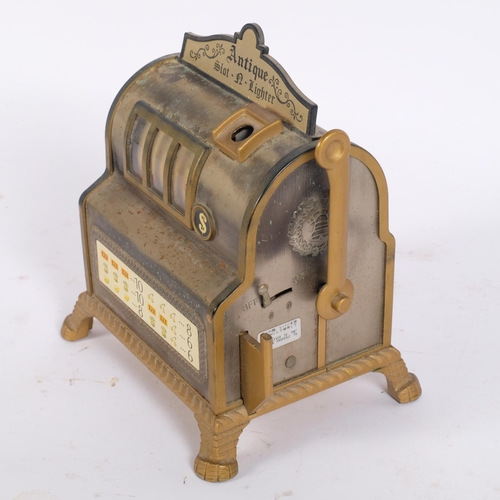 5 - A Vintage Japanese novelty 'Antique Slot-n-Lighter' slot machine table lighter, by Waco, circa 1950s... 