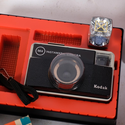 205 - A Kodak Instamatic 56-X camera and flash, boxed with outer sleeve, a Hanimex pocket camera 100 (no f... 