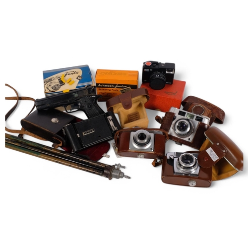 206 - A group of various cameras, including a Franka, an Agfa Kodak folding camera, a telescopic tripod, a... 