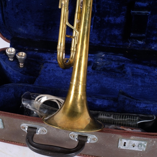 212 - A Lark brass trumpet, serial no. M4014, with 3 mouthpieces, in fitted hardshell case