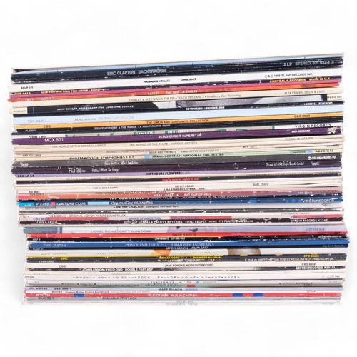 219 - A varied collection of 33 and 1/2 vinyl albums, including Onward International, Men At Work, Ultravo... 