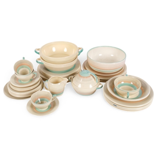 228 - A quantity of Susie Cooper and Grays Pottery dinnerware, including side plates, soup bowls, dinner p... 