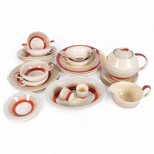 229 - A Susie Cooper part tea and dinnerware, in Red Wedding Band pattern, to include a teapot, soup bowls... 