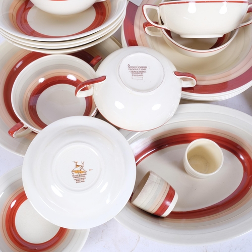 229 - A Susie Cooper part tea and dinnerware, in Red Wedding Band pattern, to include a teapot, soup bowls... 