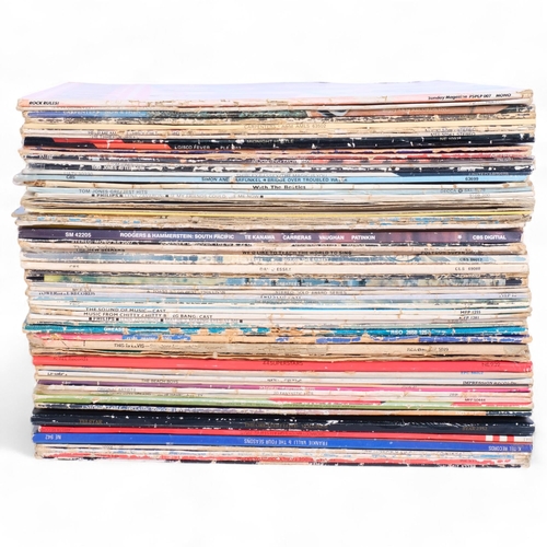 230 - A mixed collection of 33 and 1/3 vinyl albums, artists to include This Is Elvis selections from the ... 