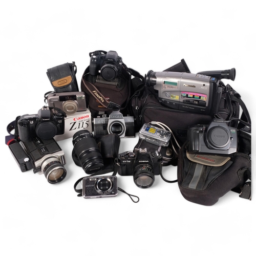 239 - A collection of various cameras, including a Cosina CT1G, a Canon EOS500, Samsung EOS73, a Canon EOS... 