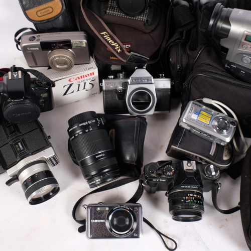 239 - A collection of various cameras, including a Cosina CT1G, a Canon EOS500, Samsung EOS73, a Canon EOS... 