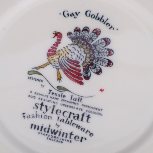 274 - JESSIE TAIT - a mid-century Midwinter style craft platter in the Gay Gobbler pattern, diameter 28cm