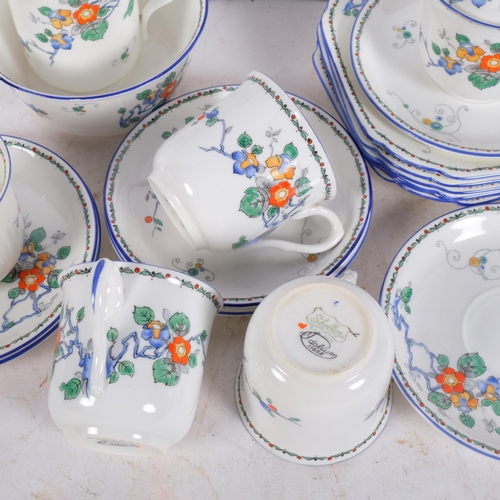 294 - 1930s Shelley porcelain 21-pice tea service, in Idalium pattern 11652, with printed and painted flor... 