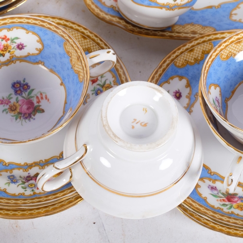 303 - Extensive Staffordshire Vintage bone china tea service, with floral decorated panels on blue ground