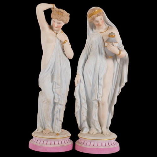 305 - A pair of bisque porcelain Classical figures, on plinths, tallest 35.5cm