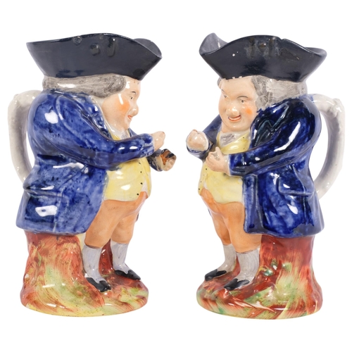 308 - A pair of Antique Staffordshire Toby jugs, H21cm