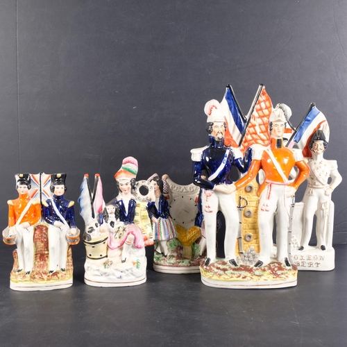 311 - A group of Victorian Staffordshire figures, including Albert and Napoleon, 27.5cm