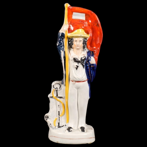 313 - An unusual Victorian Staffordshire figure being a reversible soldier and sailor, 25.5cm