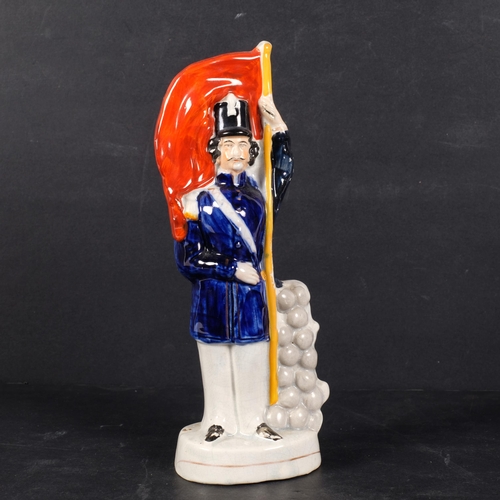 313 - An unusual Victorian Staffordshire figure being a reversible soldier and sailor, 25.5cm