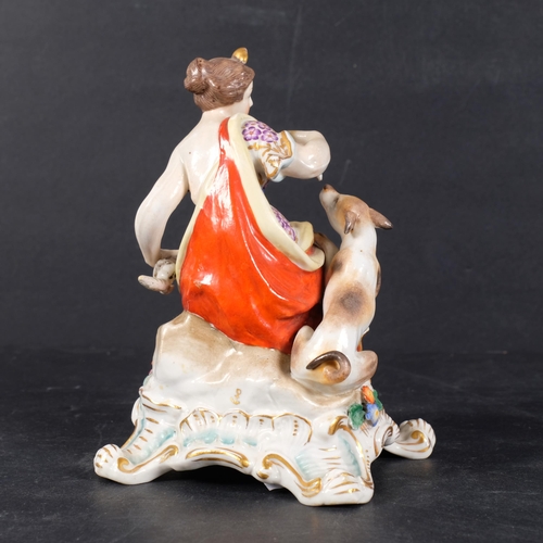 321 - A 19th century porcelain figure of a girl with a hound, 15.5cm