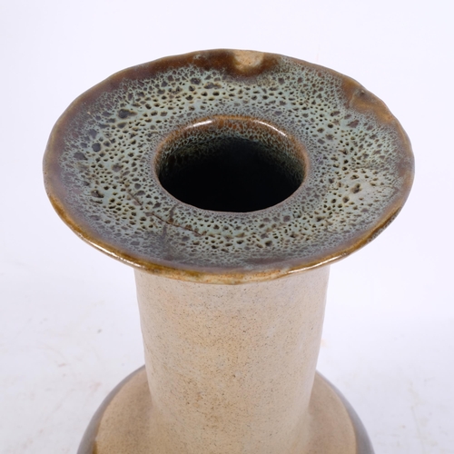 327 - A Studio pottery vase, with glazed abstract decoration, H39cm